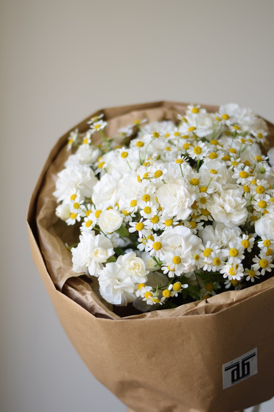 دسته‌گل بابونه و میخک